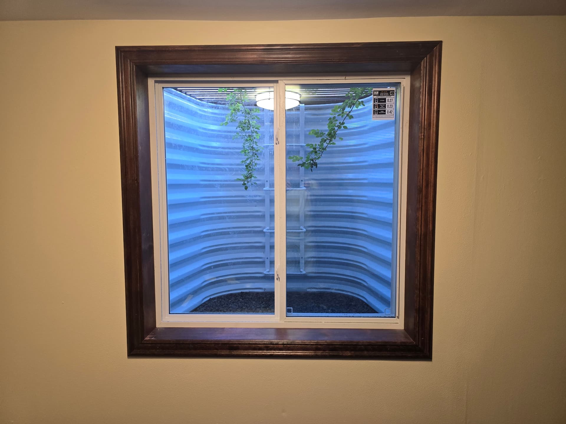 Egress Window Install with Custom Hemlock Casing and Chair Rail Trim image