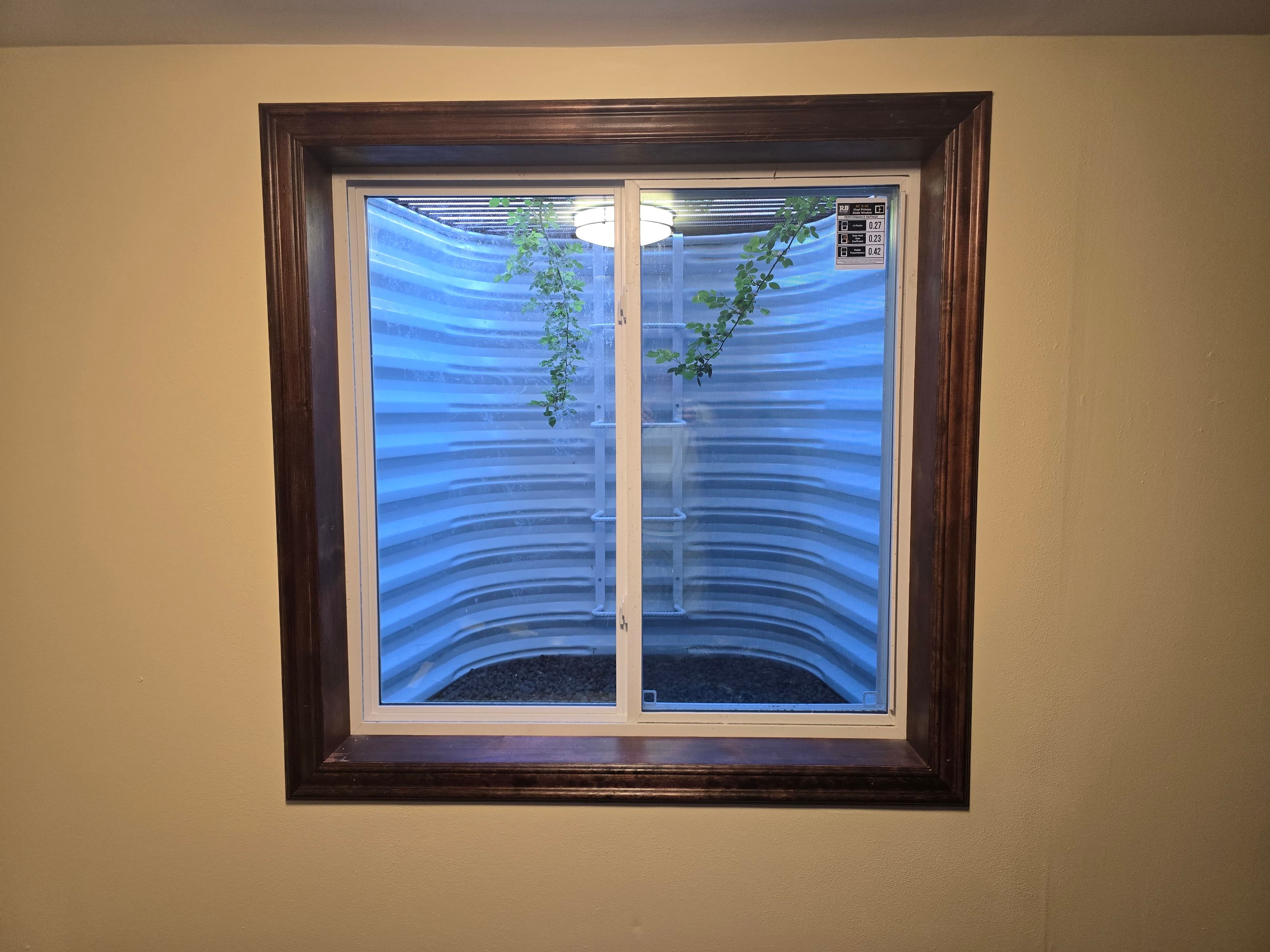 Project Egress Window Install with Custom Hemlock Casing and Chair Rail Trim image