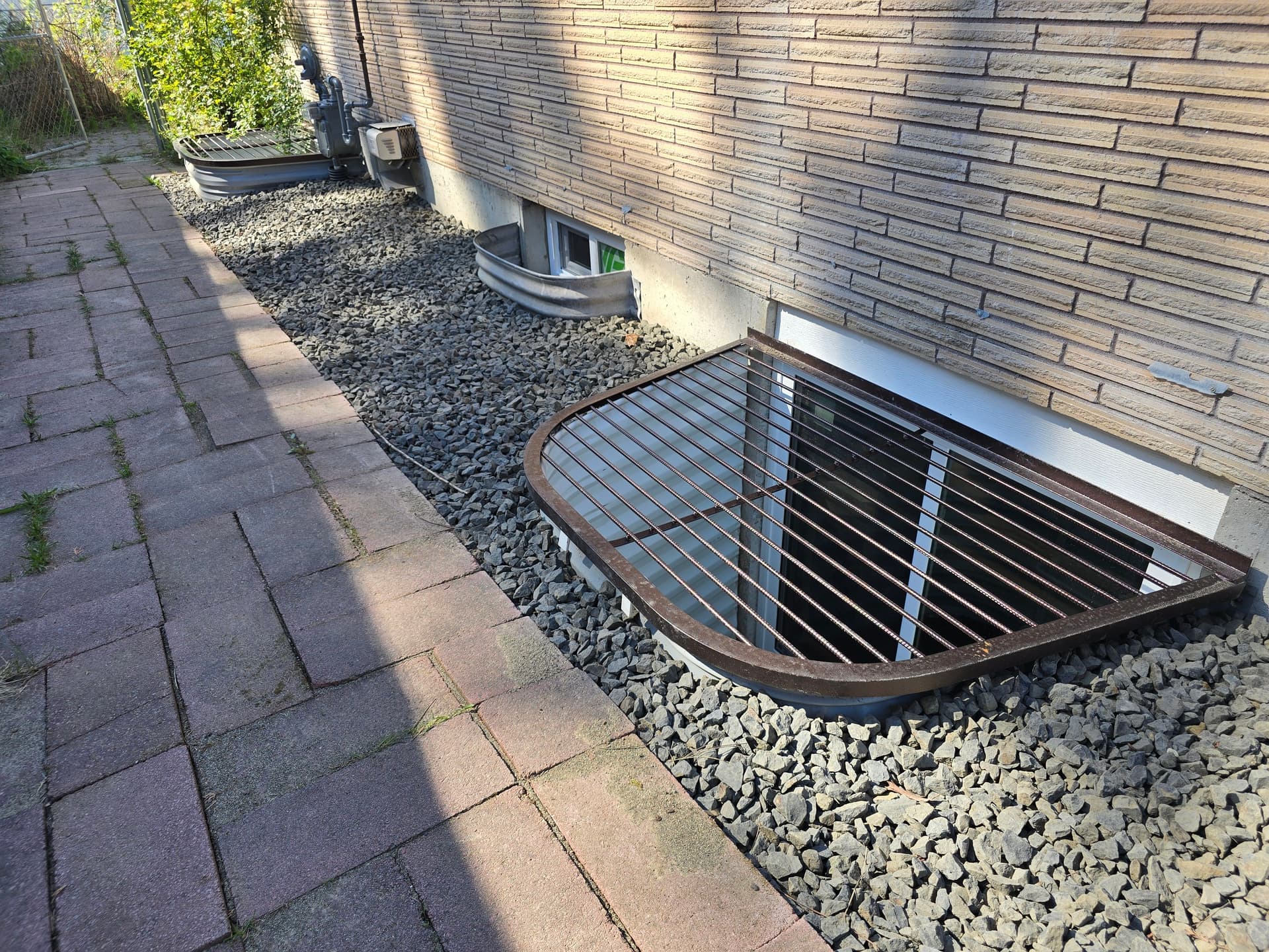 Gallery photos for When a Gas Line Gets in the Way of an Egress Window Install: Image #1