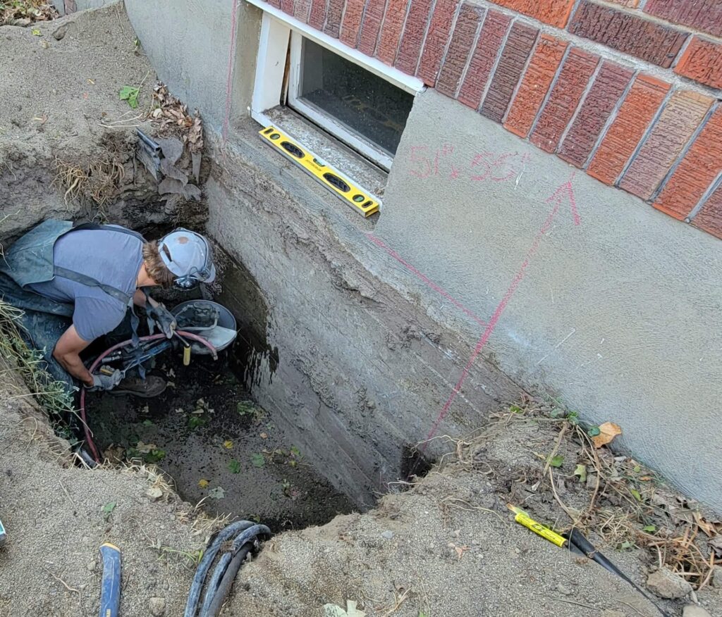 Image of concrete cutting for egress window installation in Spokane, Washington